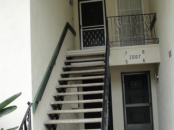 Unit upstairs on left.