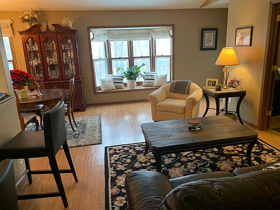 Living room with dining room on left