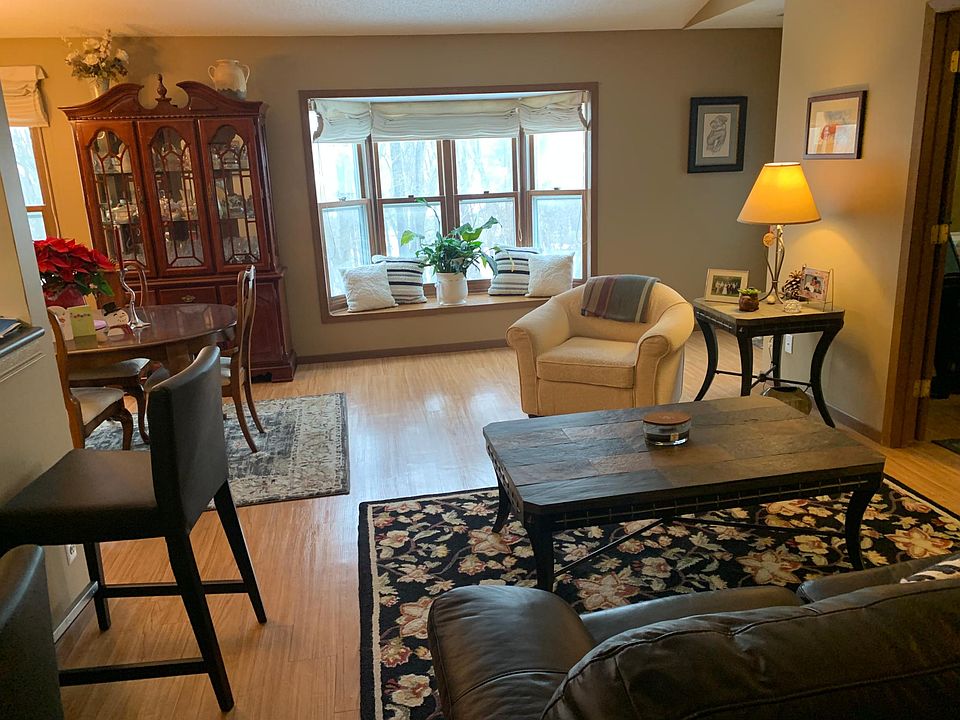 Living room with dining room on left