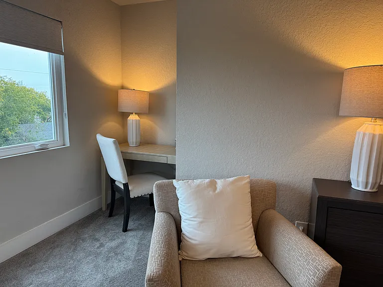 Master Bedroom features a desk and chair to work from home.