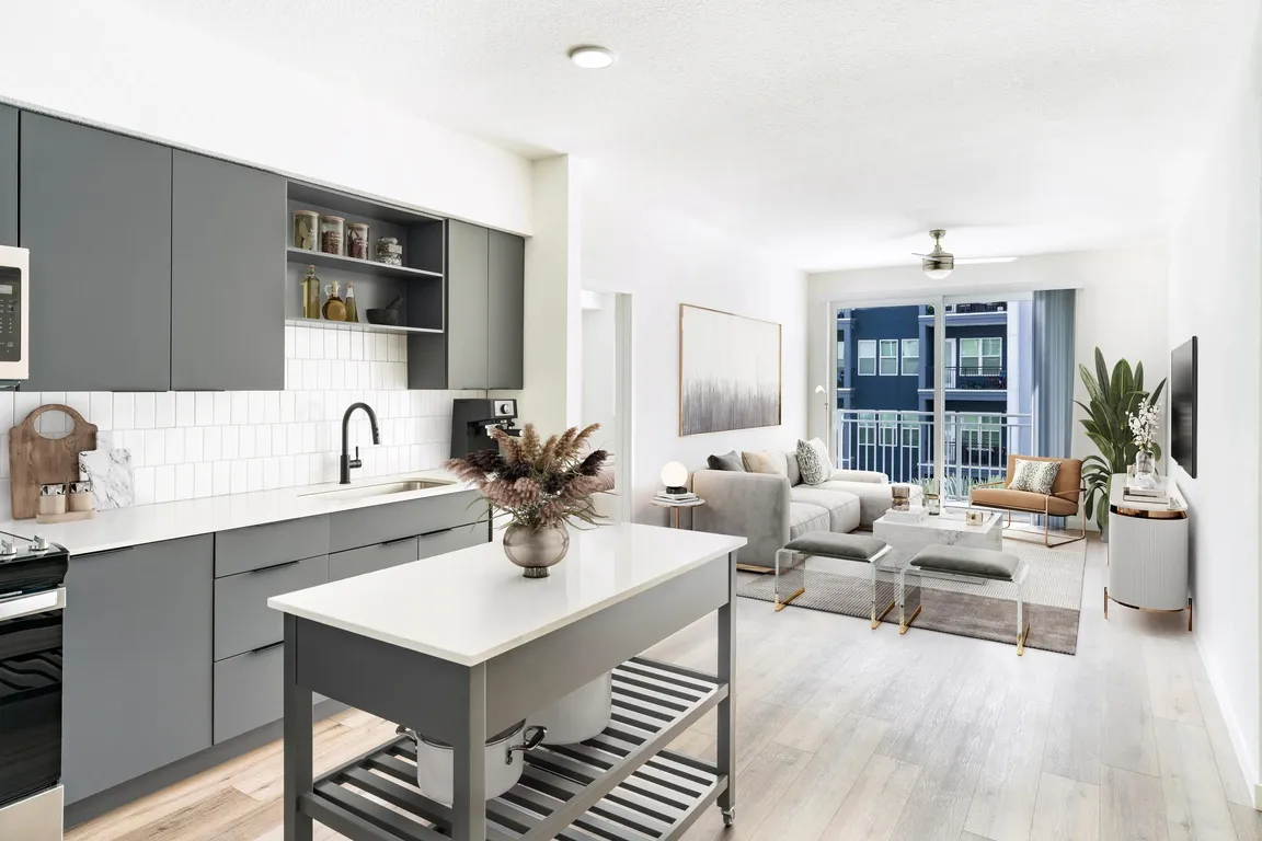 An inviting layout where the kitchen and living area connect seamlessly, offering effortless flow throughout your Modera Encore home.