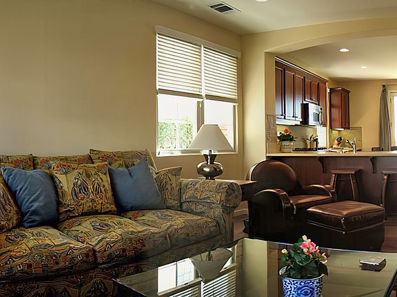 This half of the bottom floor features the kitchen and the family room.