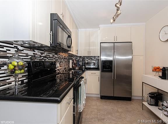 3rd image of 3675 N Country Club Dr APT 1402