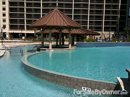 View of multilevel pool.
						:
						Swim up Pool Bar