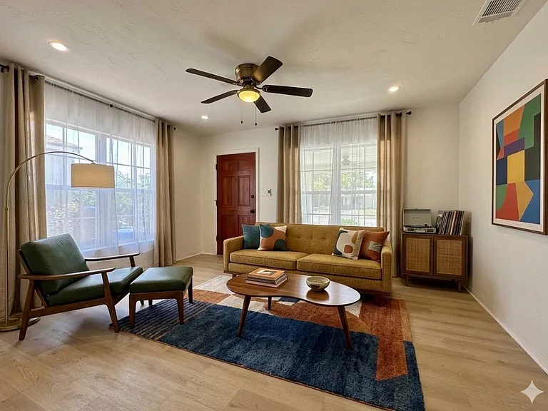 Living Room Features lots of Windows, Recessed Lights & Ceiling Fan