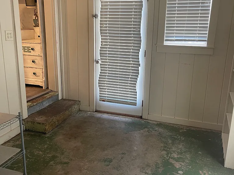 Laundry room door out to back yard
