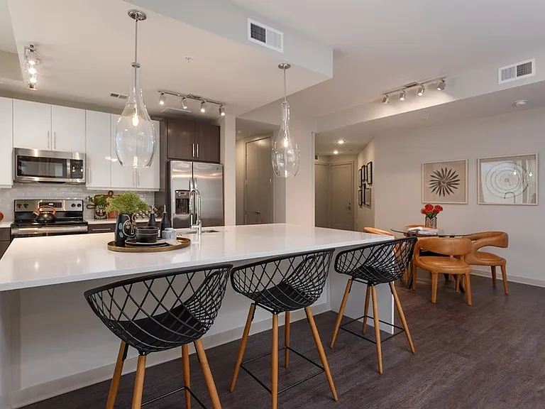 Large Kitchen Waterfall Island Open to Dining Area and Living Room (Oasis Floorplan)