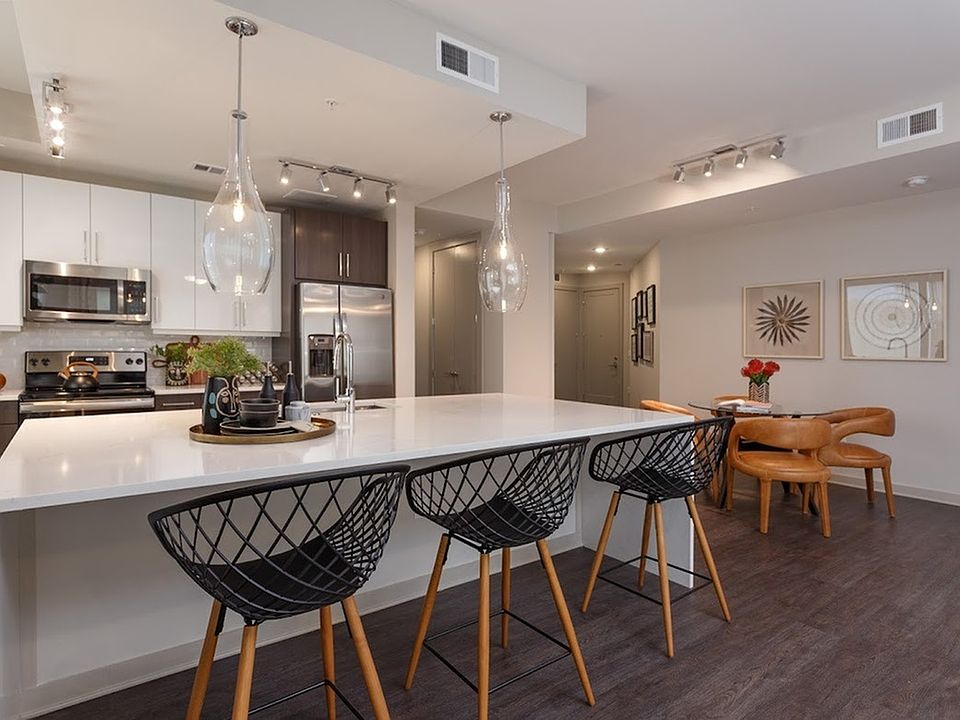 Large Kitchen Waterfall Island Open to Dining Area and Living Room (Oasis Floorplan)