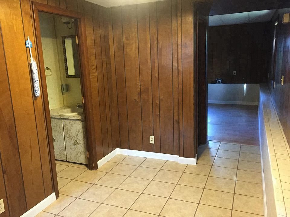 from kitchen towards living room, Bathroom on left