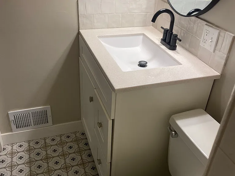 Cute master bath with shower.