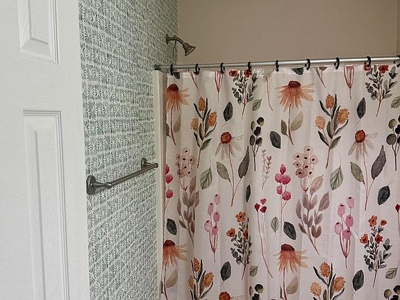 We have removed the wallpaper and repainted this bathroom; but we are accommodating to those who want to decorate in their own way; we just ask you to submit your design request for pre-approval before altering the space!