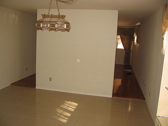 Dining room empty and chandleir