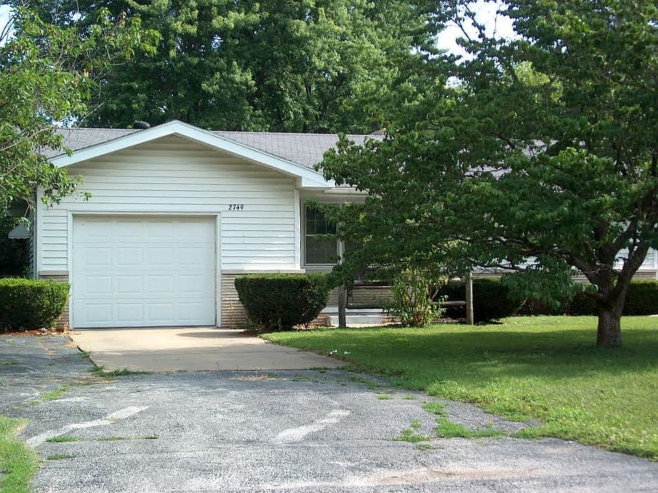 Front View of House with Attached Garage