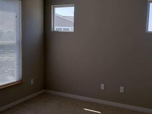 Bedroom with large windows