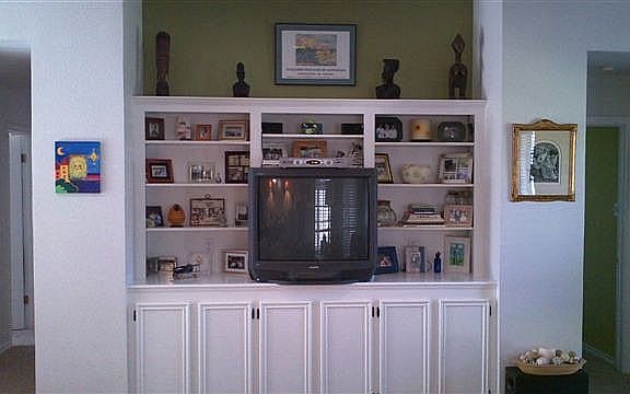 Built-in entertainment center with book shelves