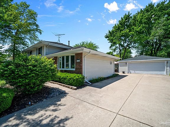 Concrete Drive leading to 2.5 car garage