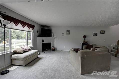 The Great room is the central gathering place of this house. Special features include: decorative gas fireplace with ornate mantel & tile surround, triple view windows and easy access to the kitchen and breakfast room.