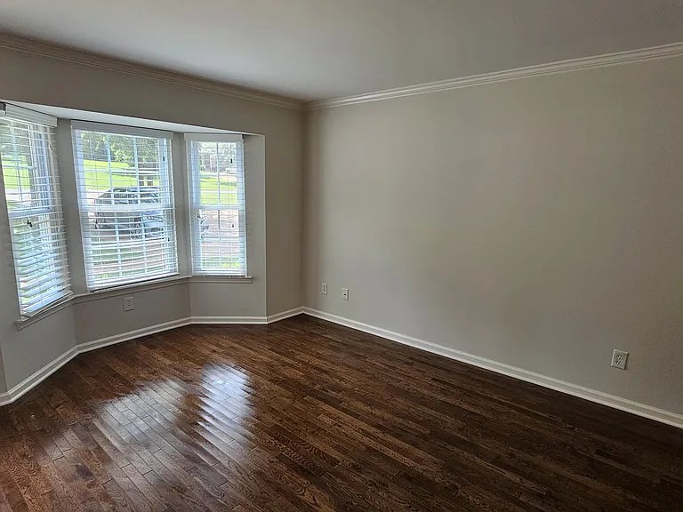 Living room with bay window.