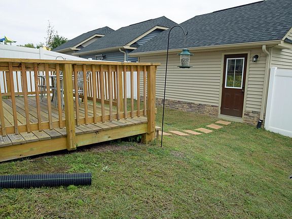 FULLY FENCED YARD, LAWN SERVICE INCLUDES THE AREA INSIDE THE FENCE