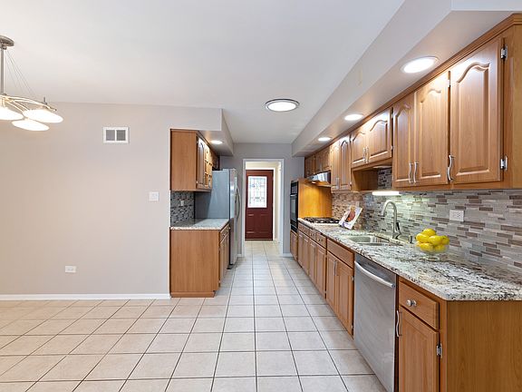 4th image of 1218 E 166th Pl