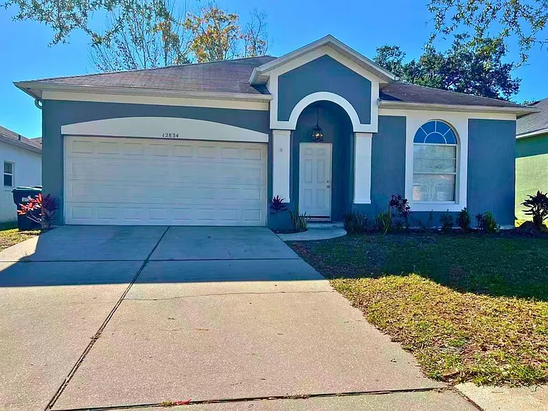 12834 Woodbury Glen Dr — Photo 1