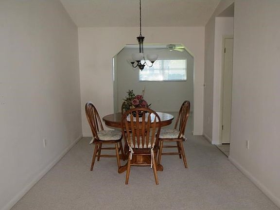 Formal Dining area open to kitchen and den/family room.