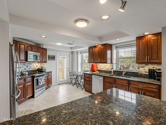 5th image of 4650 Links Village Dr Unit A304