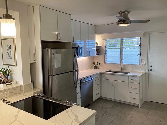 Newly remodeled kitchen! Quartz countertops. Dishwasher, refrigerator, microwave, toaster oven, and oven range.