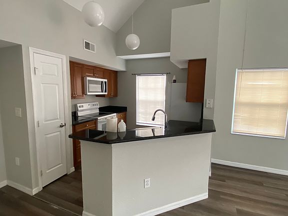 4th image of 9030 Lake Chase Island Way #900
