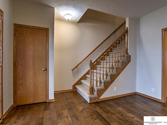 You will love the hand-scraped flooring through-out the main level of this home.