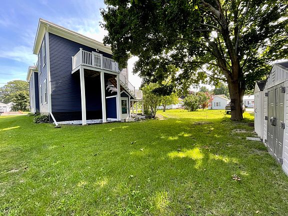 Backyard of the building. Storage sheds located in this area.