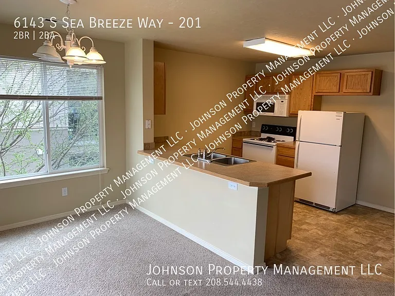 6143 S Sea Breeze Way #201 — Photo 4