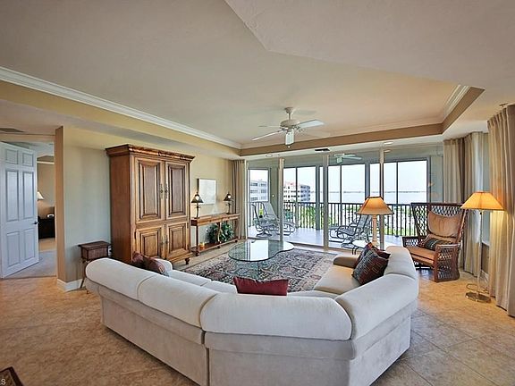 Great Room with backdrop of the River and Marina