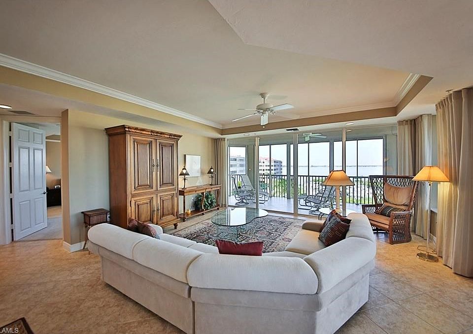 Great Room with backdrop of the River and Marina