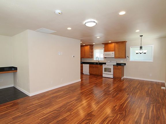 Kitchen, dining, living, study nook.