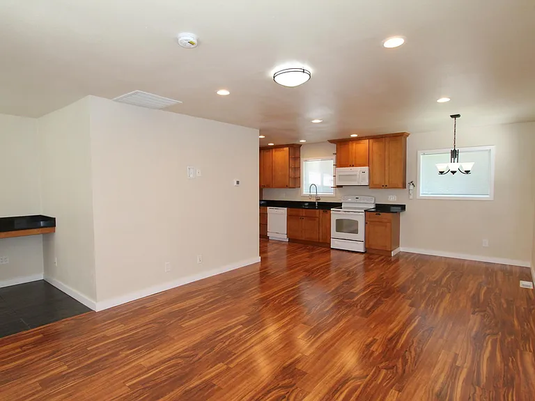 Kitchen, dining, living, study nook.