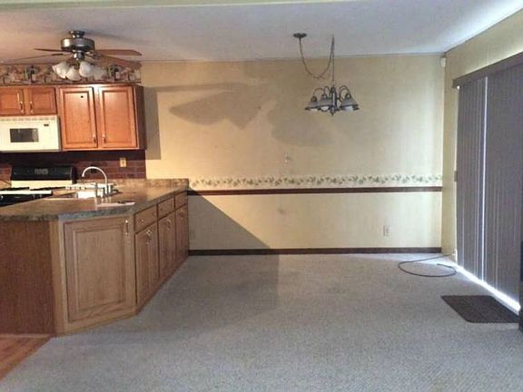 dining area with lake view out new patio doors 