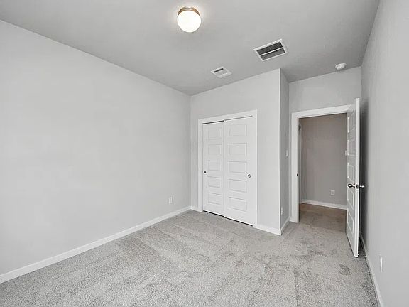 Downstairs Bedroom / Office: Flexible space for a guest bedroom or home office.