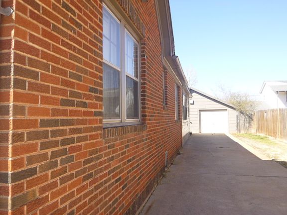 DRIVEWAY/SIDE OF HOME