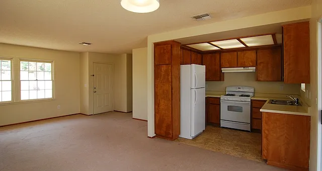 Open plan living, dining and kitchen areas. Kitchen has been updated - new photos coming soon!