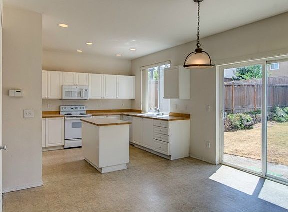Bright kitchen with plenty of storage.