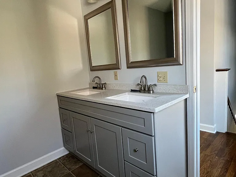 Upstairs bath with a two sink vanity