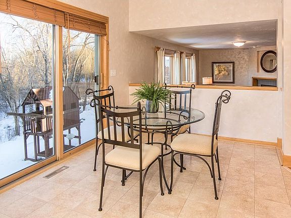 Dining area with great views of the private backyard and nature area
