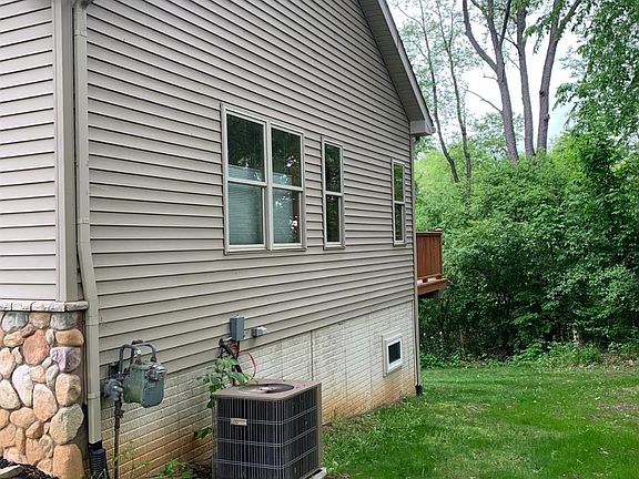 5th image of 7727 Huron River Dr