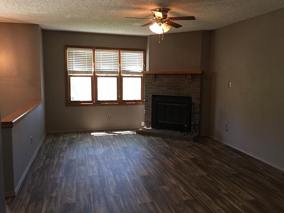 Empty Living Room, Wood Burning Fireplace
