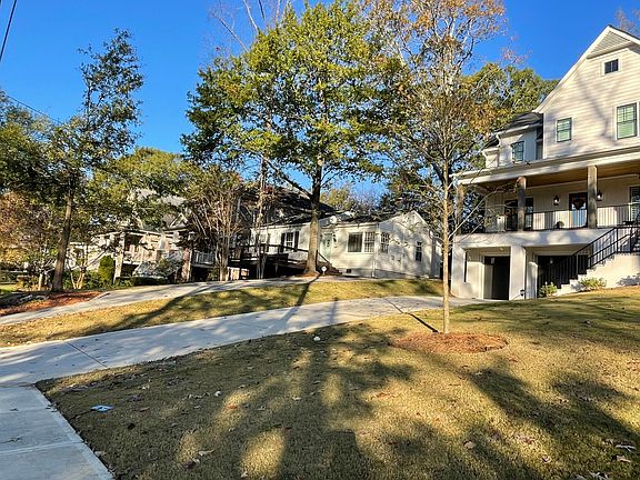 Surrounded by million dollar homes on quiet family-friendly Brookhaven street with sidewalks. Speed bumps.