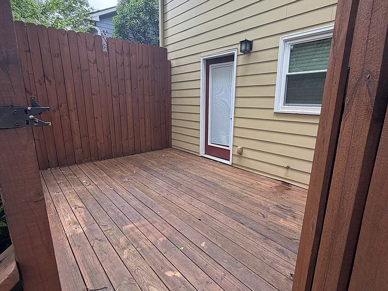 Outside deck off the kitchen - gated and locked for privacy