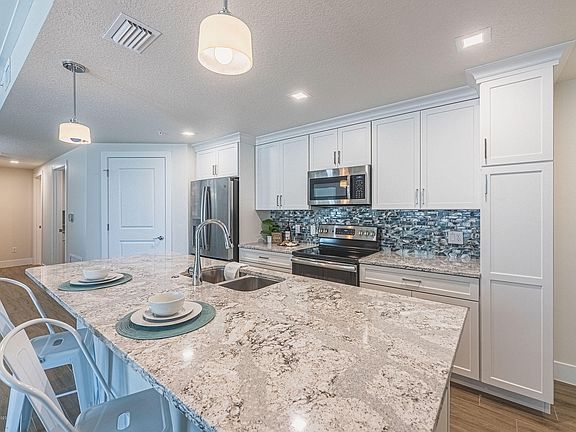 2nd image of 6015 Turtle Beach Ln #203