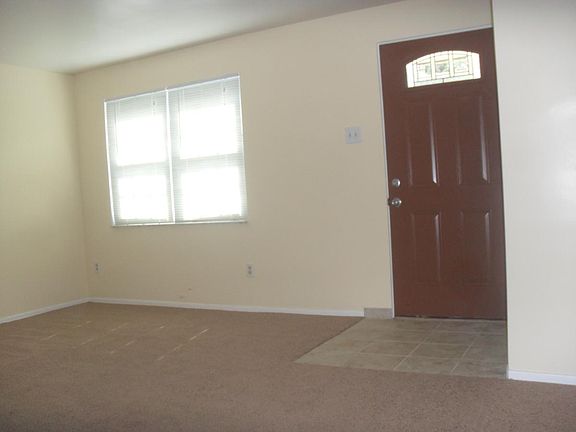 Front living room window and entrance door
