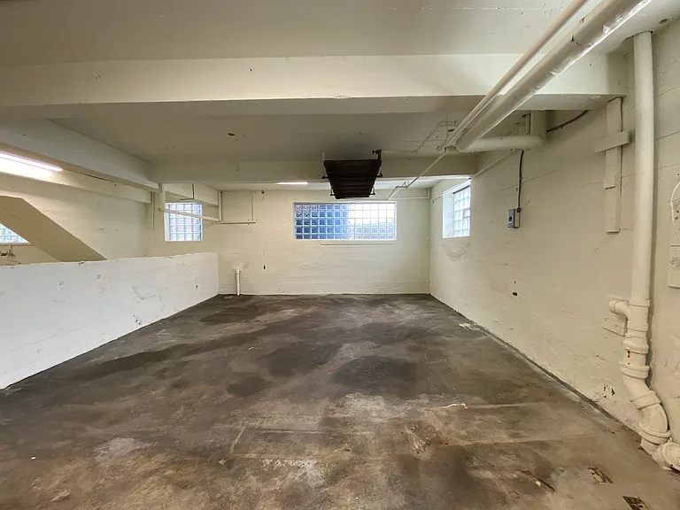 This sectioned space could easily be transformed into its own purposed area or as an extension of the main space.